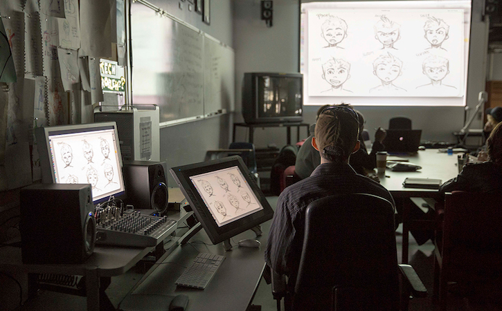 Animation class with students and screen