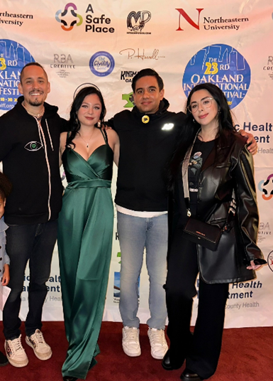 Professor Rafael Flores and the Latina/o/x/e Film Club posing for a promo photo