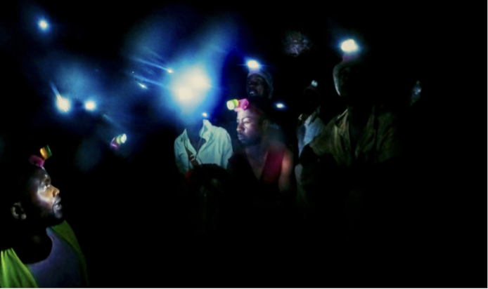 People with flashlights on their heads